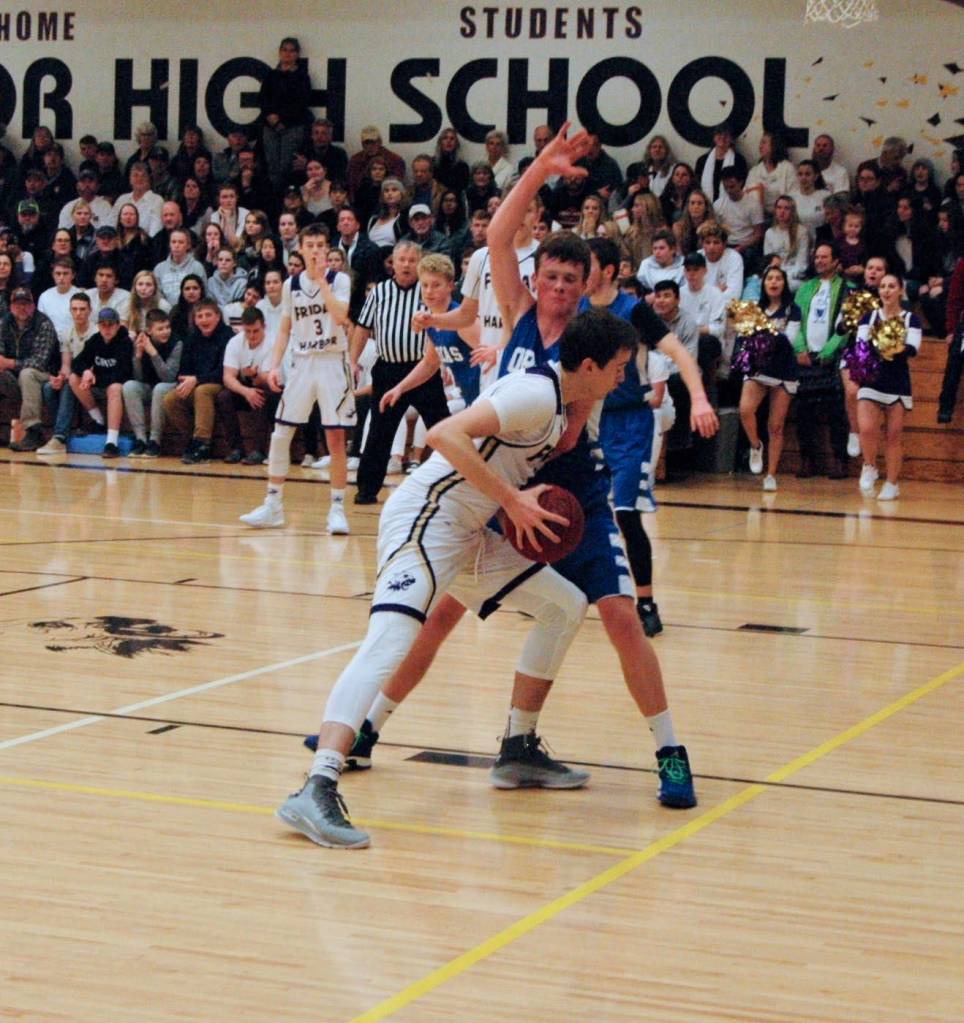 Contributed photo/John Stimpson                                Kyle Mapstead muscles his way to the basket.
