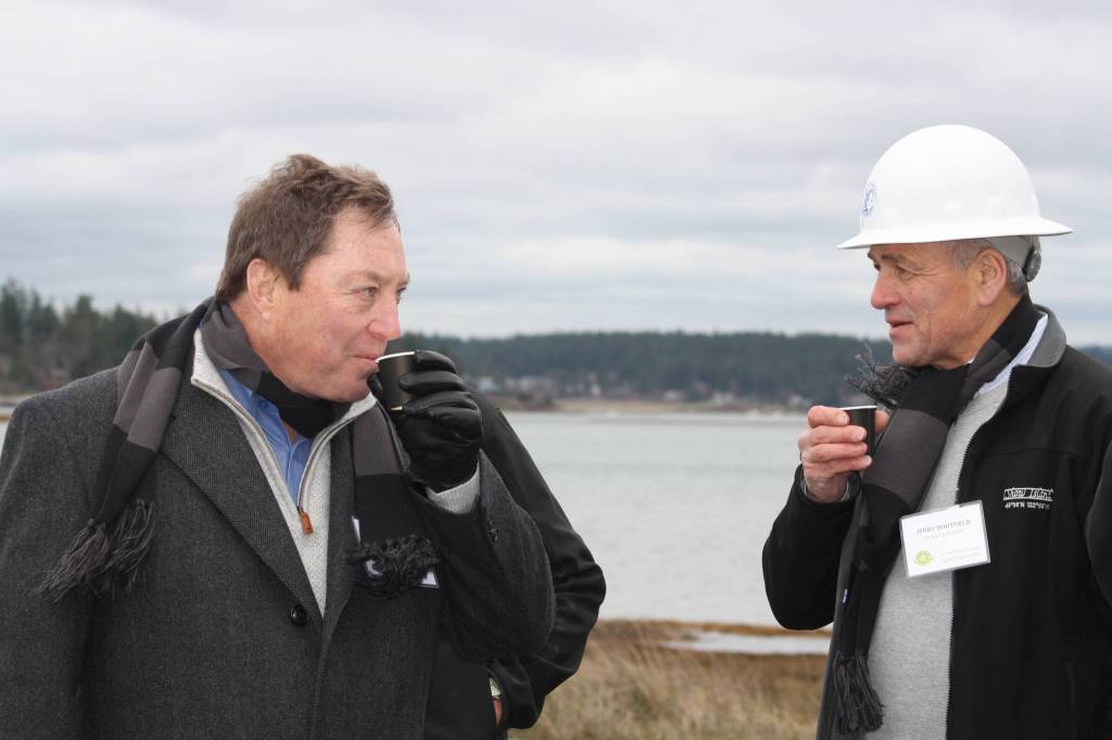 Staff photo/Hayley Day                                County Councilman Jamie Stephens (left) enjoys sake at the event.