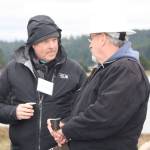 Staff photo/Hayley Day                                County Councilman Rick Hughes (left) enjoys sake at the event.