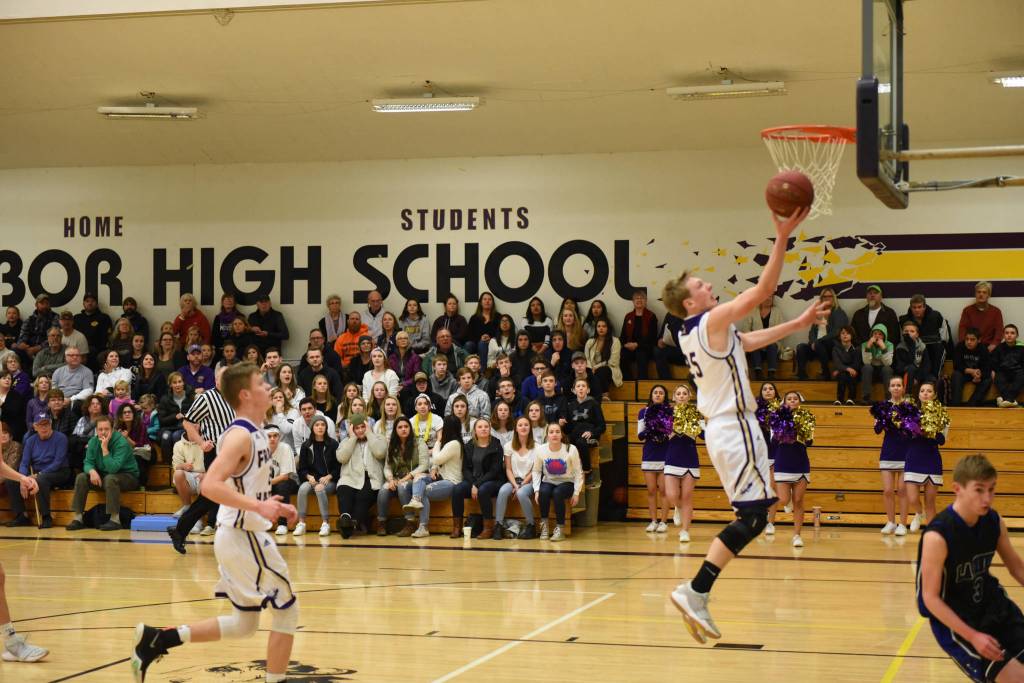 Contributed photo/John Stimpson                                Isaac Mayer for a 2-point layup.