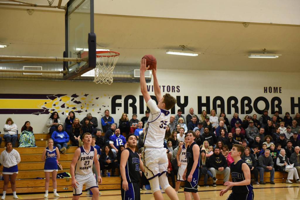 Contributed photo/John Stimpson                                Marshall Clark jumps for 2 points.