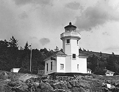 Contributed images/lighthousefriends.com                                The Lime Kiln Lighthouse in 1951 with keepers houses behind.