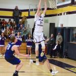 Contributed photo/John Stimpson                                Kyle Mapstead jumps for the sky to score 2 points.
