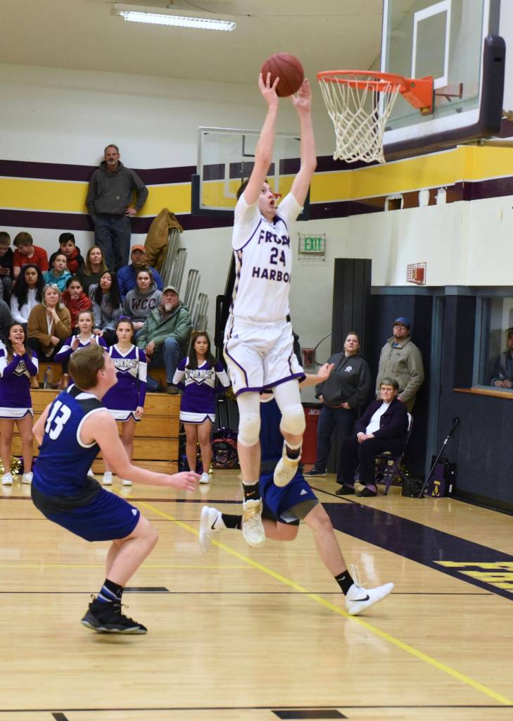 Contributed photo/John Stimpson                                Kyle Mapstead jumps for the sky to score 2 points.