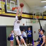 Contributed photo/John Stimpson                                Marshall Clark slam dunks to the cheers of the crowd.