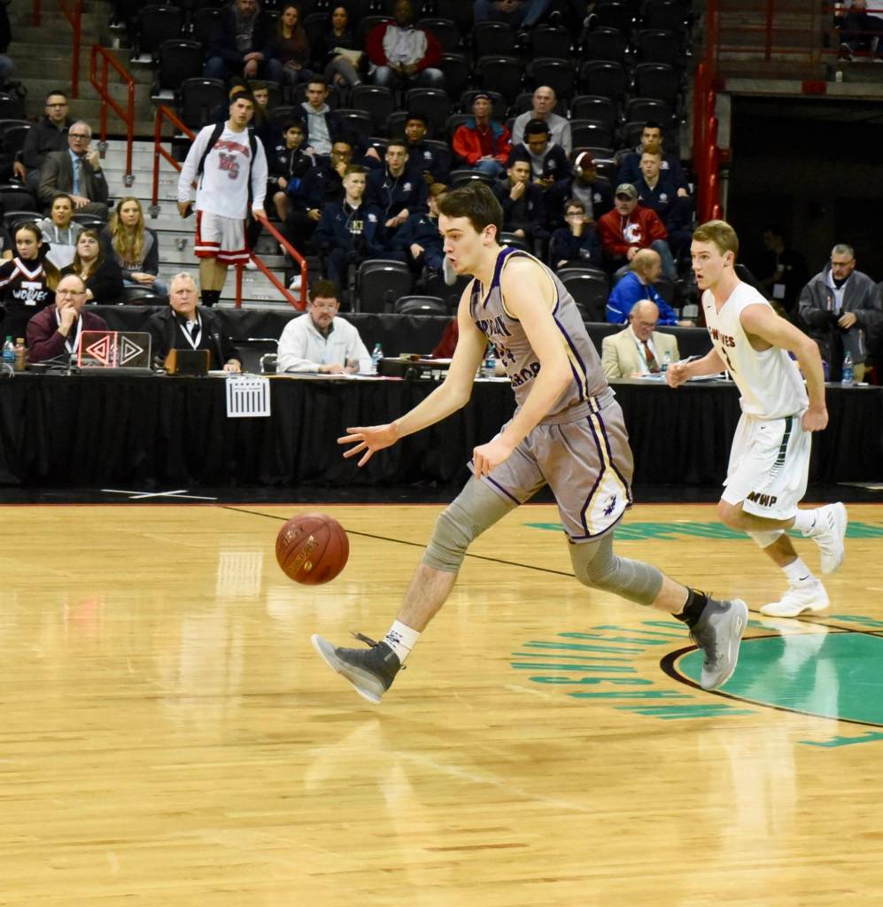 <em><em><em><em><strong>Contributed photo/ John Stimpson</strong></em></em></em></em>                                <em><em><em><em><strong> </strong></em></em></em></em><em>Kyle Mapstead leads the fast break.</em>