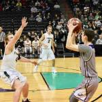 <em><em><em><em><strong>Contributed photo/ John Stimpson</strong></em></em></em></em>                                <em>Lucas Chevalier sinks a three-pointer.</em>