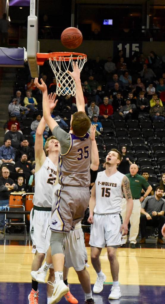 <em><em><em><em><strong>Contributed photo/ John Stimpson</strong></em></em></em></em>                                <em>Marshall Clark lays up another two.</em>