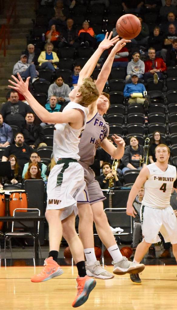 <em><em><em><strong>Contributed photo/ John Stimpson</strong></em></em></em>                                <em>Rio Black grabs a rebound.</em>