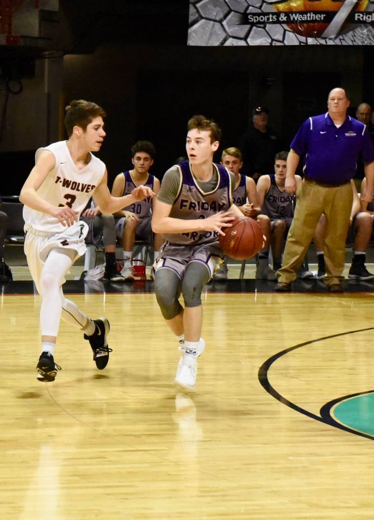 <em><em><strong>Contributed photo/ John Stimpson</strong></em></em>                                <em><em><strong> </strong></em></em><em>Lucas Chevalier brings the ball down court.</em>