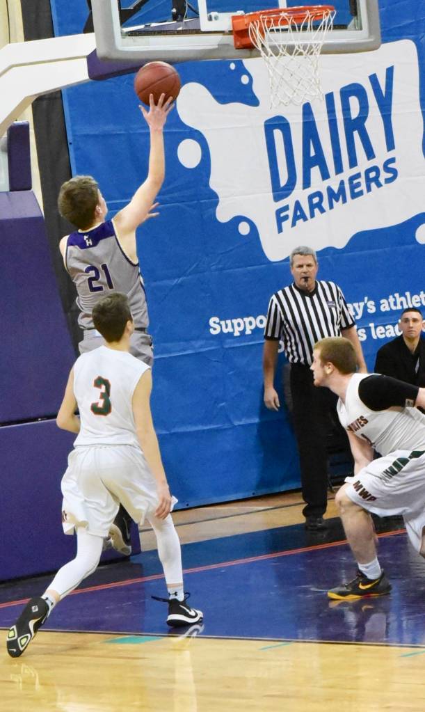 <em><em><strong>Contributed photo/ John Stimpson</strong></em></em>                                <em>Chase Wilson lays up a two-pointer.</em>