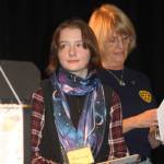 Staff photo/Heather Spaulding                                First-place winner Marcia King with her check and trophy.