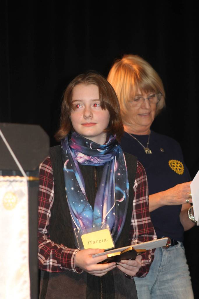 Staff photo/Heather Spaulding                                First-place winner Marcia King with her check and trophy.