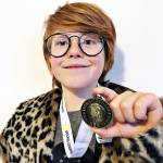 Contributed photo                                Henry Jensen with his medal for winning the local geography bee.