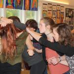 Staff photo/Hayley Day                                Junior Ula Grace said she plays the whistleblower, who is attacked by fellow classmates in this scene.