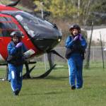 Staff photo/Hayley Day                                A helicopter lands on the high school field to deploy the medevac crew.
