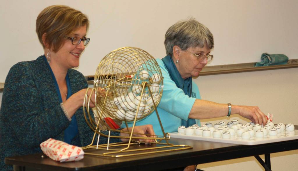 Staff photo/Hayley Day                                Katie Loring and Barbara Sharp help call numbers at a Bingo, sponsored by the Soroptimist International of Friday Harbor, for screen-free week.