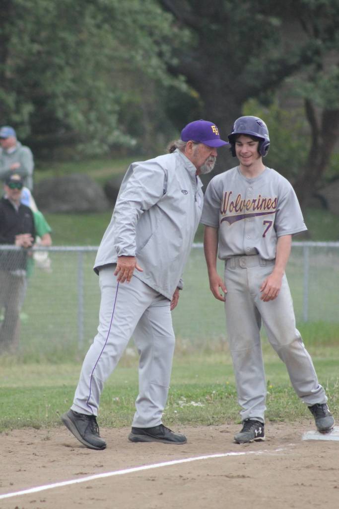 Staff photo/Heather Spaulding Coach Rich Warin and Wolverine Satchel Pieples.