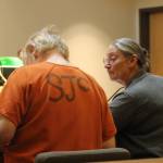 Staff photo Heather Spaulding. Eric Kulp talks with his council, Colleen Kenimond.