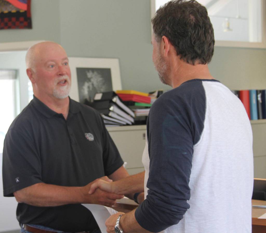 Staff photo/Hayley Day                                San Juan Island School District board member TJ Heller is sworn in on June 13.