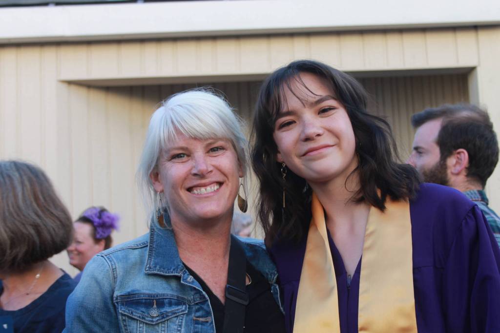 Staff photo/Heather Spaulding. Graduate Ella Hu with her mother.
