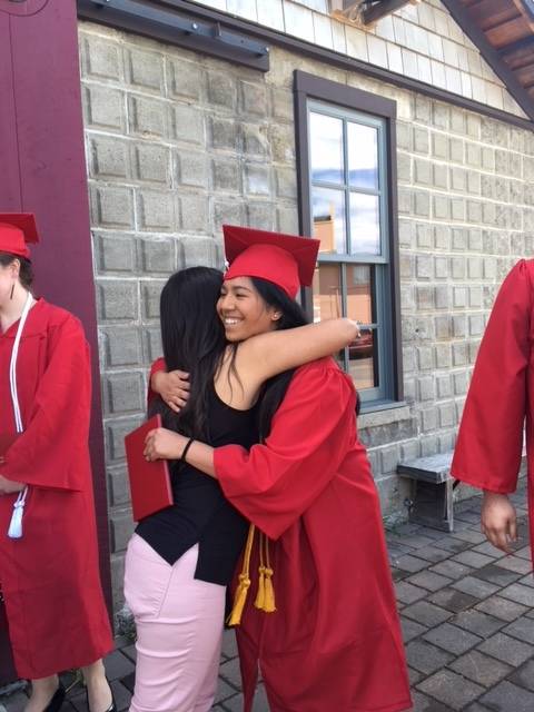 Staff photos/Heather Spaulding                                Ana Sanabria hugs a friend.