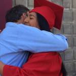 Staff photo/Heather Spaulding. Ana Sanabria hugs Friday Harbor High School counselor Gordon Waite.