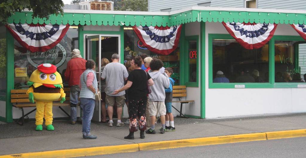 Staff photo/Hayley Day                                Long lines formed during the 60th-anniversary celebration, which offered 1958 pricing.