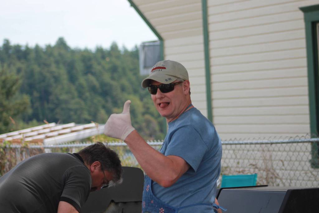 Staff photo/Heather Spaulding Busy grilling.