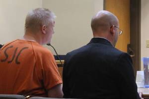 Staff photo/ Hayley Day                                Eric A. Kulp and his attorney in San Juan County Superior Court on Aug. 3.