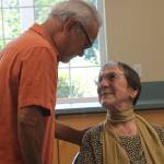 Staff photo/Heather Spaulding                                Parin Columna says goodbye to Lilo Rustman.