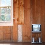 Staff photo/Hayley Day                                Adrian Pipers 1973 video, The Mythic Being, is on display at English Camp.