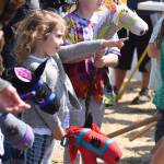 Staff photo/Tate Thomson                                Kids mount their stick horse saddles for the race.