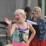 Staff photo/Heather Spaulding. Ballerina waves to the crowd.