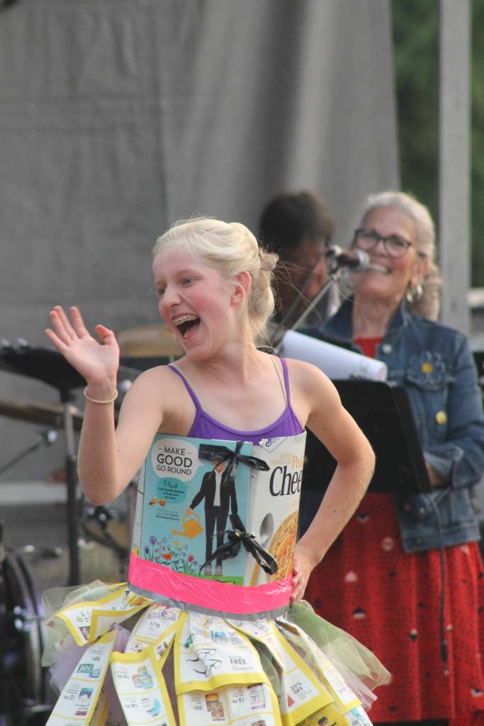 Staff photo/Heather Spaulding. Ballerina waves to the crowd.