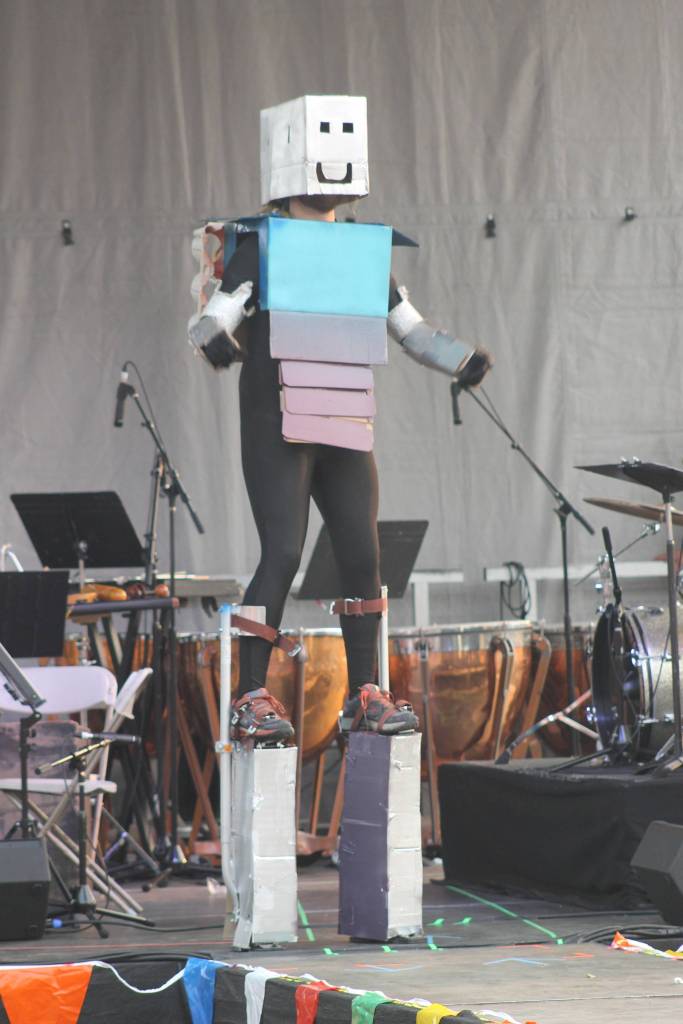 Staff photo/Heather Spaulding A happy robot struts down the runway.