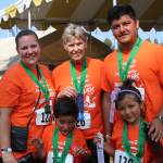 Staff photo/Hayley Day                                Participants attend the medal ceremony after the race.