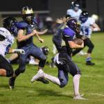 Contributed photo/John Stimpson                                No. 22, Kyson Jackson, takes off on a sweep for good yardage gain.