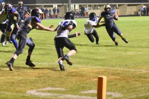 Contributed photo/John Stimpson                                Emeron Geiser races for the goal line on Sept. 7.