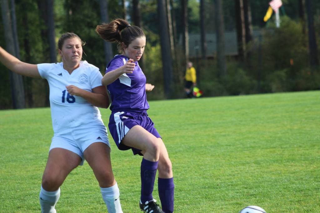 Staff photo/Heather Spaulding. Fallon Taylor defends the ball.