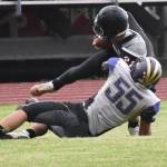 Contributed photo/John Stimpson                                Austin Wynn tackles a Wolves running back.