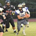 Contributed photo/John Stimpson                                Wolverine Kyson Jackson scrambles for big yardage on the sweep.
