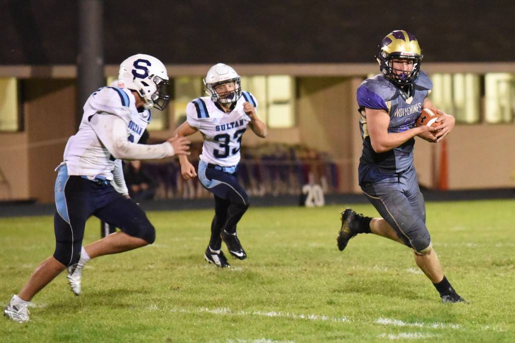 Contributed photo/John Stimpson                                After receiving a pass, Emeron Geiser takes off on a big yard gain.