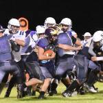 Contributed photo/ John Stimpson                                Wolverine No. 41 Emeron Geiser seaches for a hole.