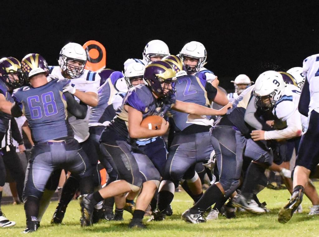 Contributed photo/ John Stimpson                                Wolverine No. 41 Emeron Geiser seaches for a hole.