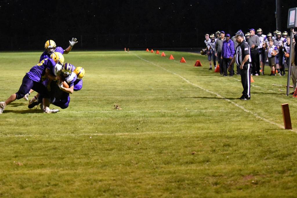 Contributed photo / John K. Stimpson                                Wolverine Kyson Jackson, 22, drives to within 5 yards of the goal line. The team is watching with anticipation!
