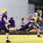 Contributed photo / John K. Stimpson                                Emeron keeps on running with a Lions defender hanging on