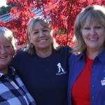 Contributed photo/Tamara Weaver                                Leslie Byron, APS executive director; Jaime Ellsworth, APS Board member; and Julie Corey, APS Board member and past APS Board president celebrate the grand opening on Sept. 29.