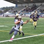 Contributed photo/John Stimpson                                Wolverine running back Kyson Jackson crosses into the end zone scoring the only goal for Friday Harbor.