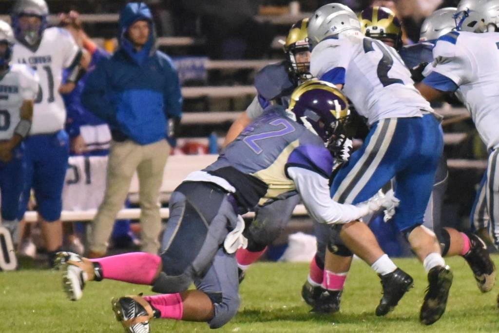 Contributed photo/John StimpsonMatro Blackmon stops the Braves runner in his tracks.